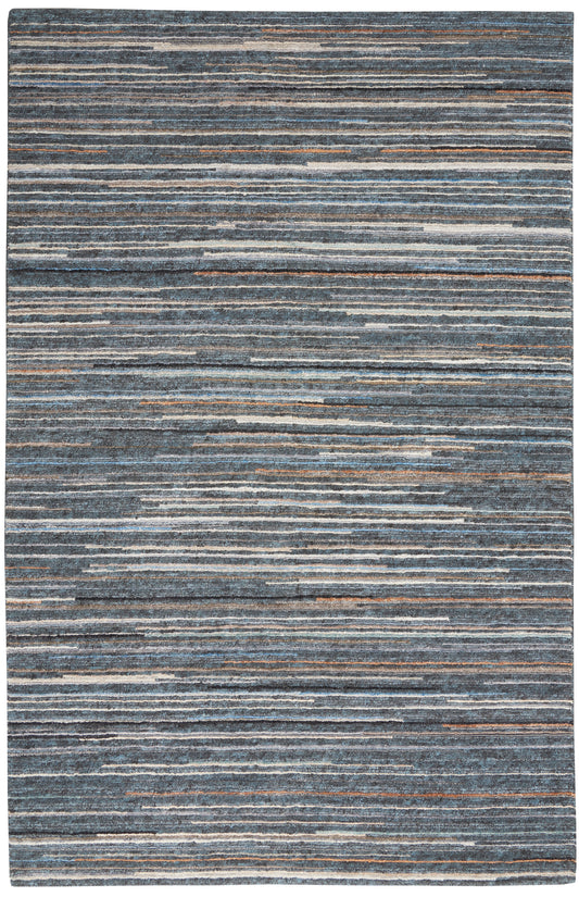 Blue-gray striped area rug with irregular light bands and subtle orange accents; woven texture.