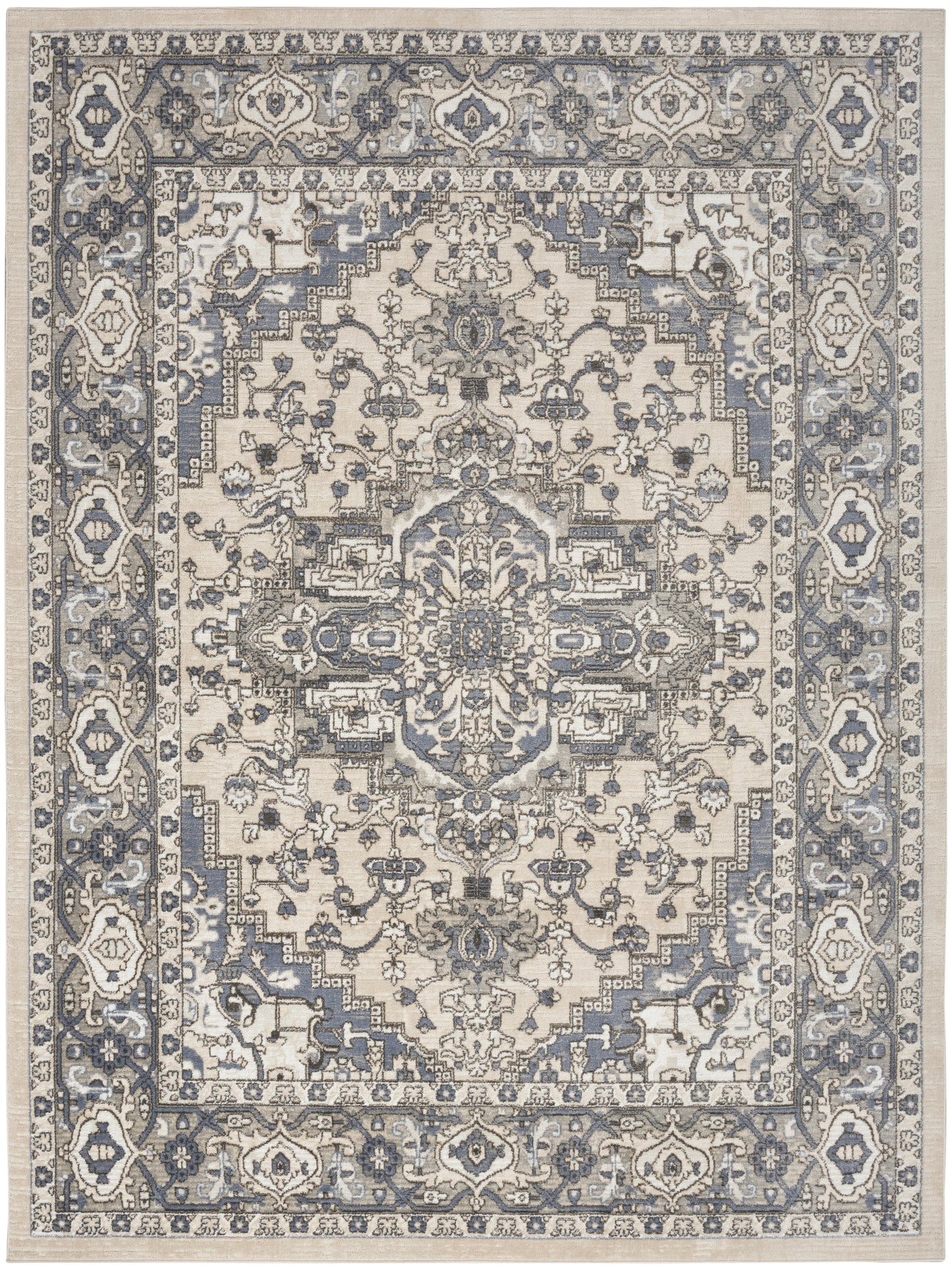 Persian-style area rug in ivory and blue-gray with a central medallion and ornate floral border.