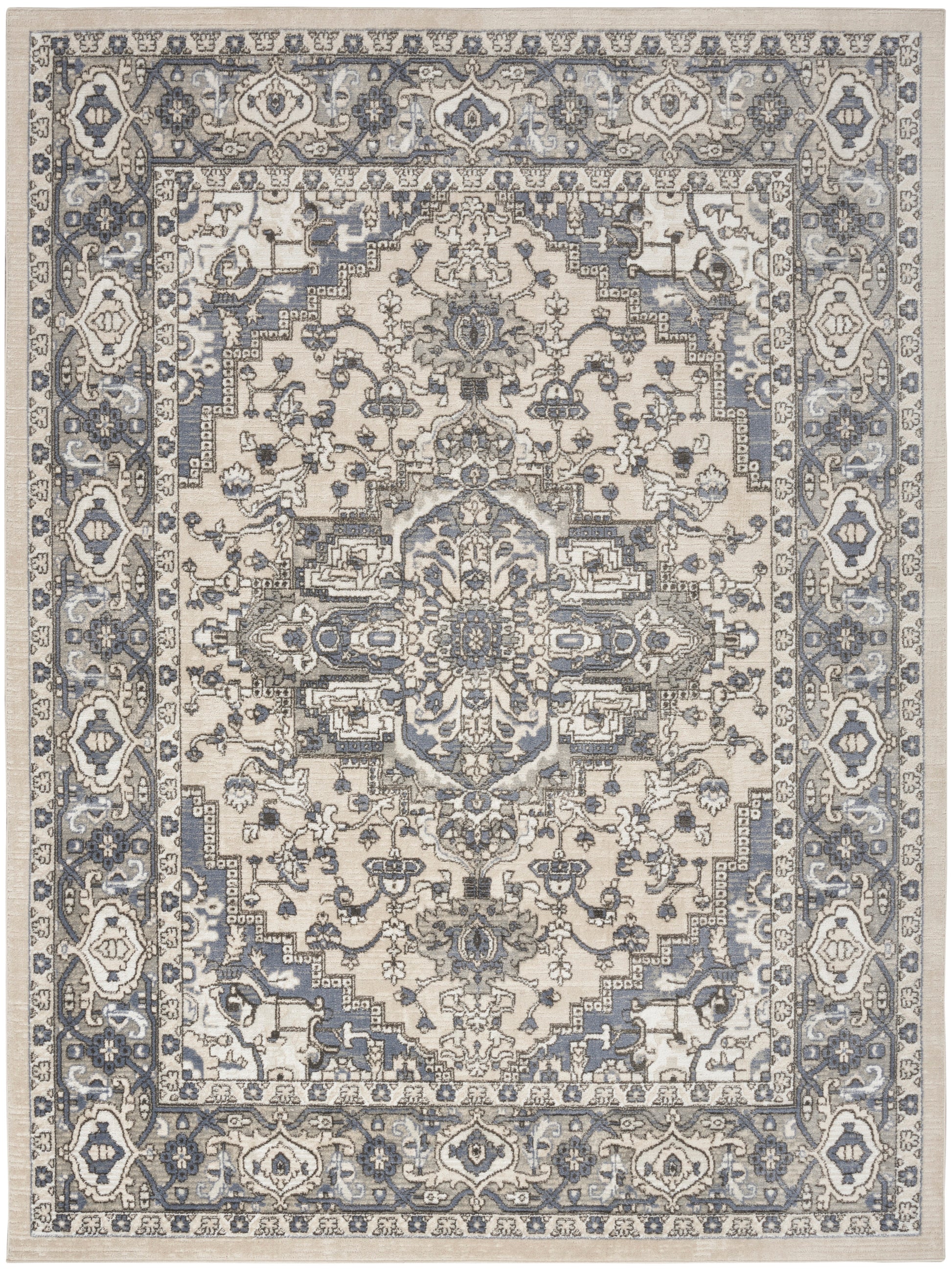 Persian-style area rug in ivory and blue-gray with a central medallion and ornate floral border.