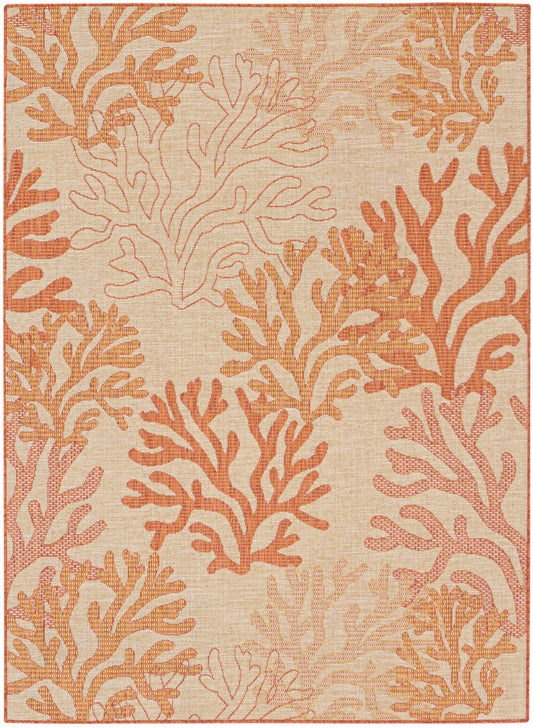 Orange coral reef pattern rug on beige background, woven coastal style with warm coral tones and textured fibers.