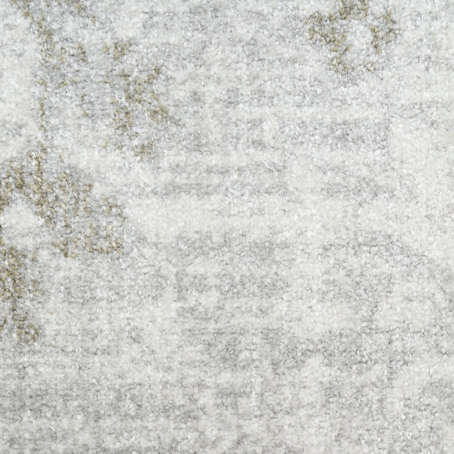 Light gray area rug with a subtle distressed beige-gold pattern and plush texture.
