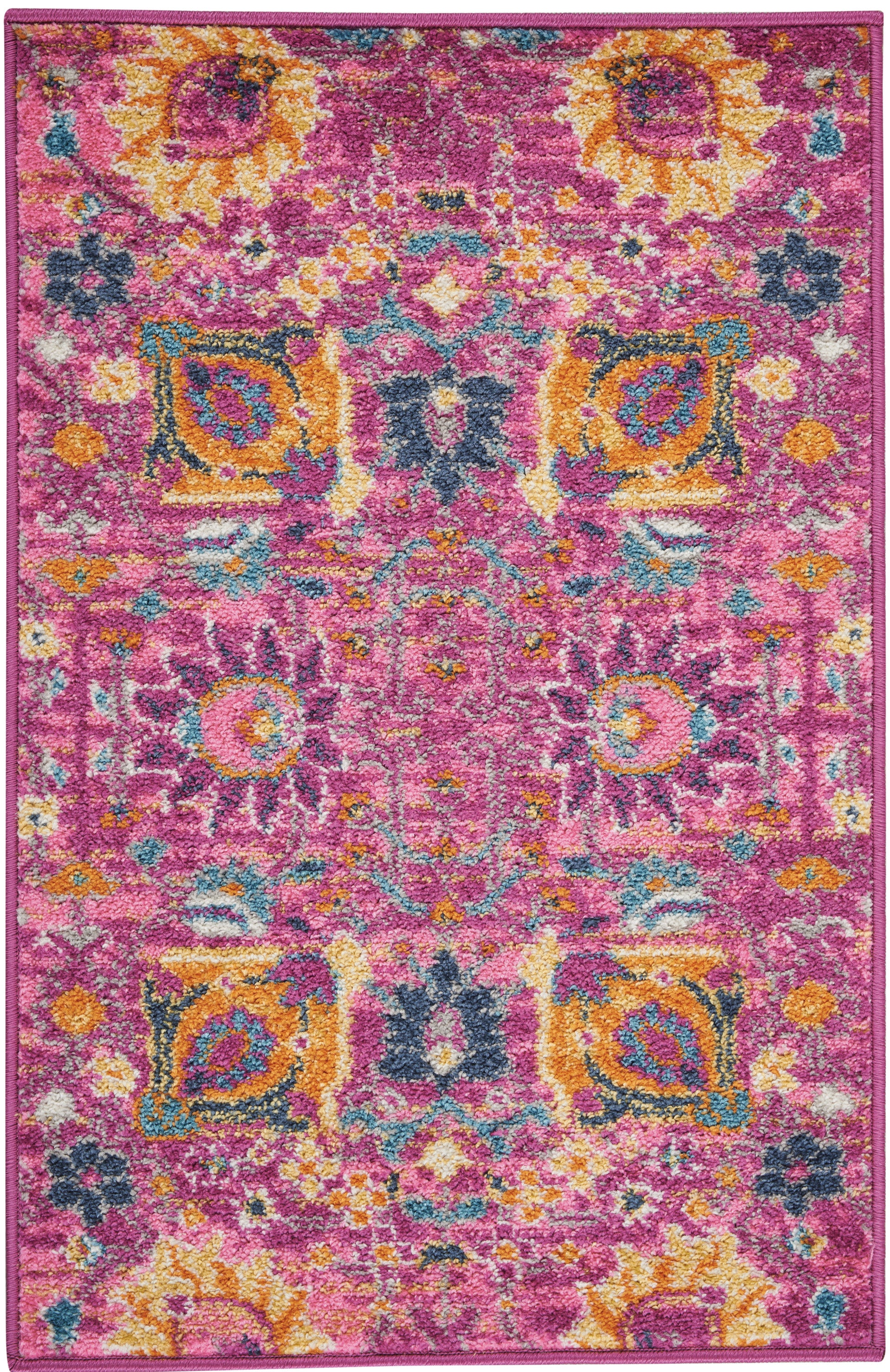 Magenta oriental-style area rug with yellow, teal, and orange floral medallions; plush, richly patterned, rectangular.