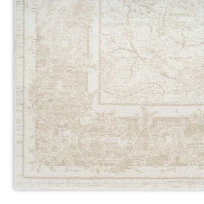 Beige distressed patterned rug with antique border, rectangular shape, soft neutral tones for living rooms.