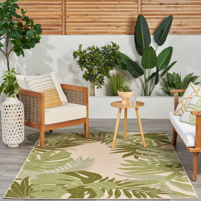 Outdoor rug with tropical leaf pattern, 6' x 9'.