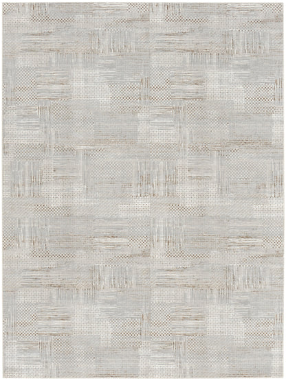 Rectangular neutral area rug in light gray and beige, woven patchwork texture with a modern geometric design.