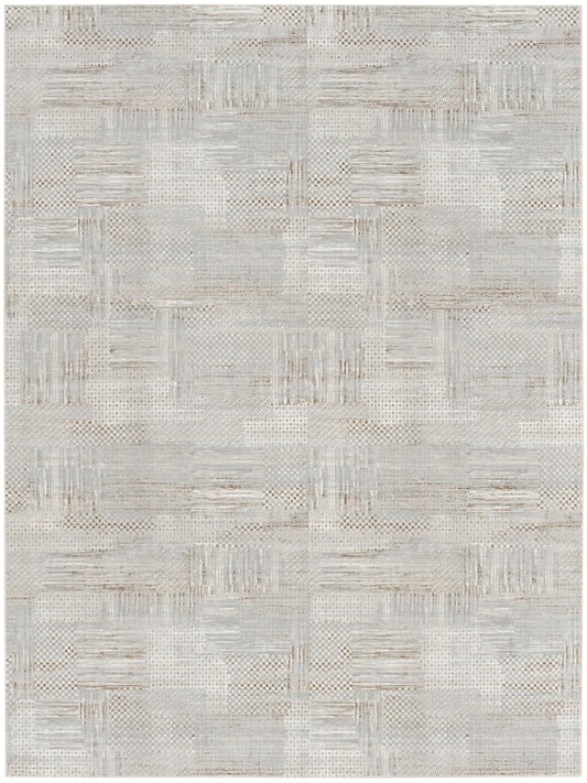 Rectangular neutral area rug in light gray and beige, woven patchwork texture with a modern geometric design.
