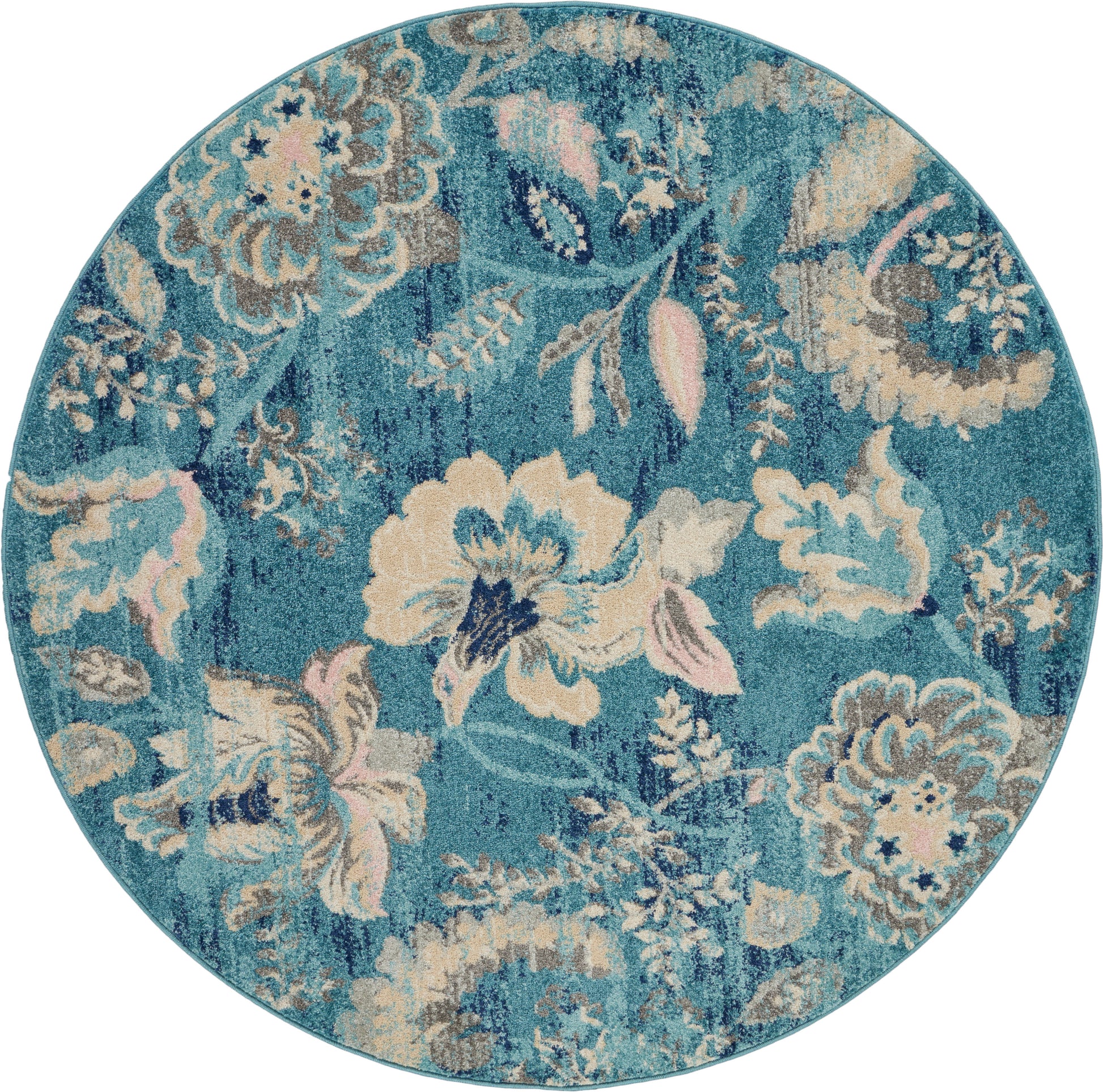 Round teal floral rug with beige and cream flowers and blush pink accents; ornate damask pattern.