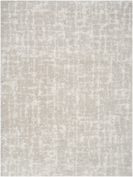 Neutral gray-beige textured area rug with a soft plush pile and subtle abstract pattern.