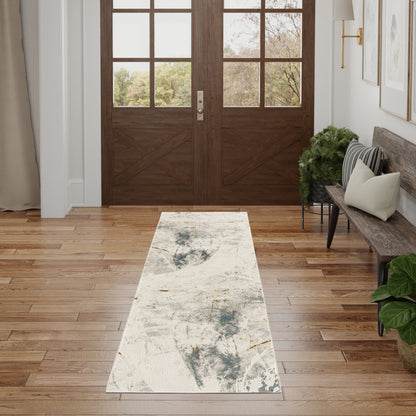 Double wooden entry doors with glass panels, abstract blue-gray runner rug, hardwood floor, bench with cushions, plants.