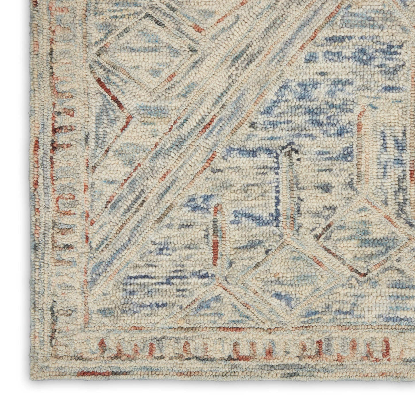 Cream and blue geometric rug with rust accents; wool, rectangular oriental-inspired design for living room.