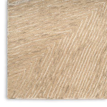 Beige textured rug with white chevron stripes in woven boucle; rectangular natural floor covering.