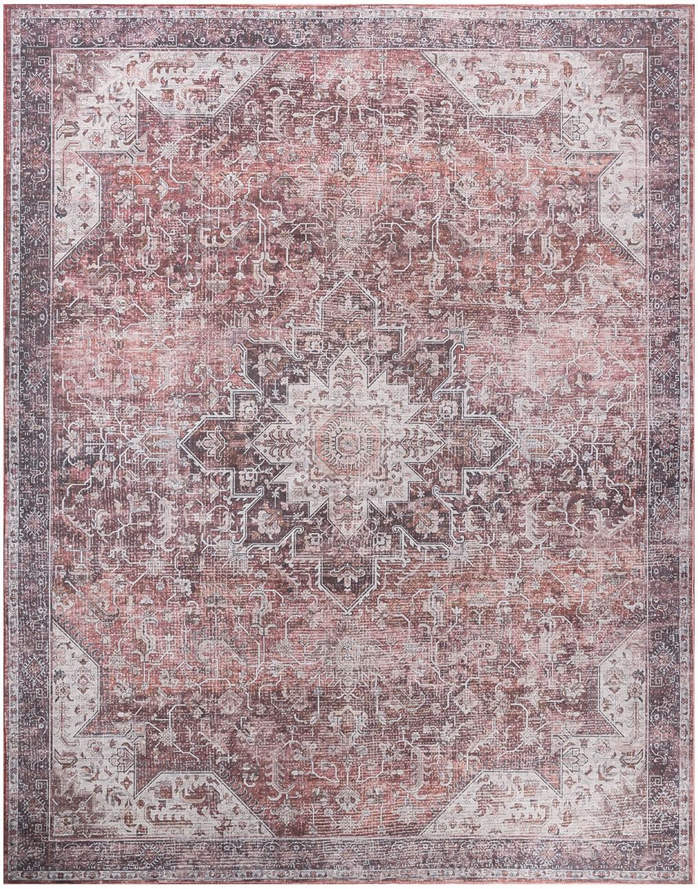 Distressed pink Oriental rug with ivory central medallion, ornate border and vintage floral pattern.