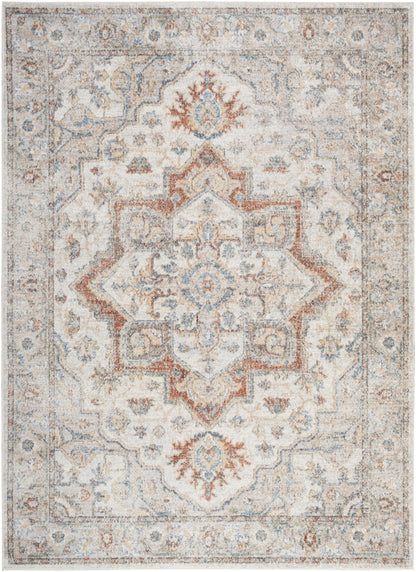 Distressed vintage oriental area rug with ivory, pale blue and rust tones; central medallion and ornate border.