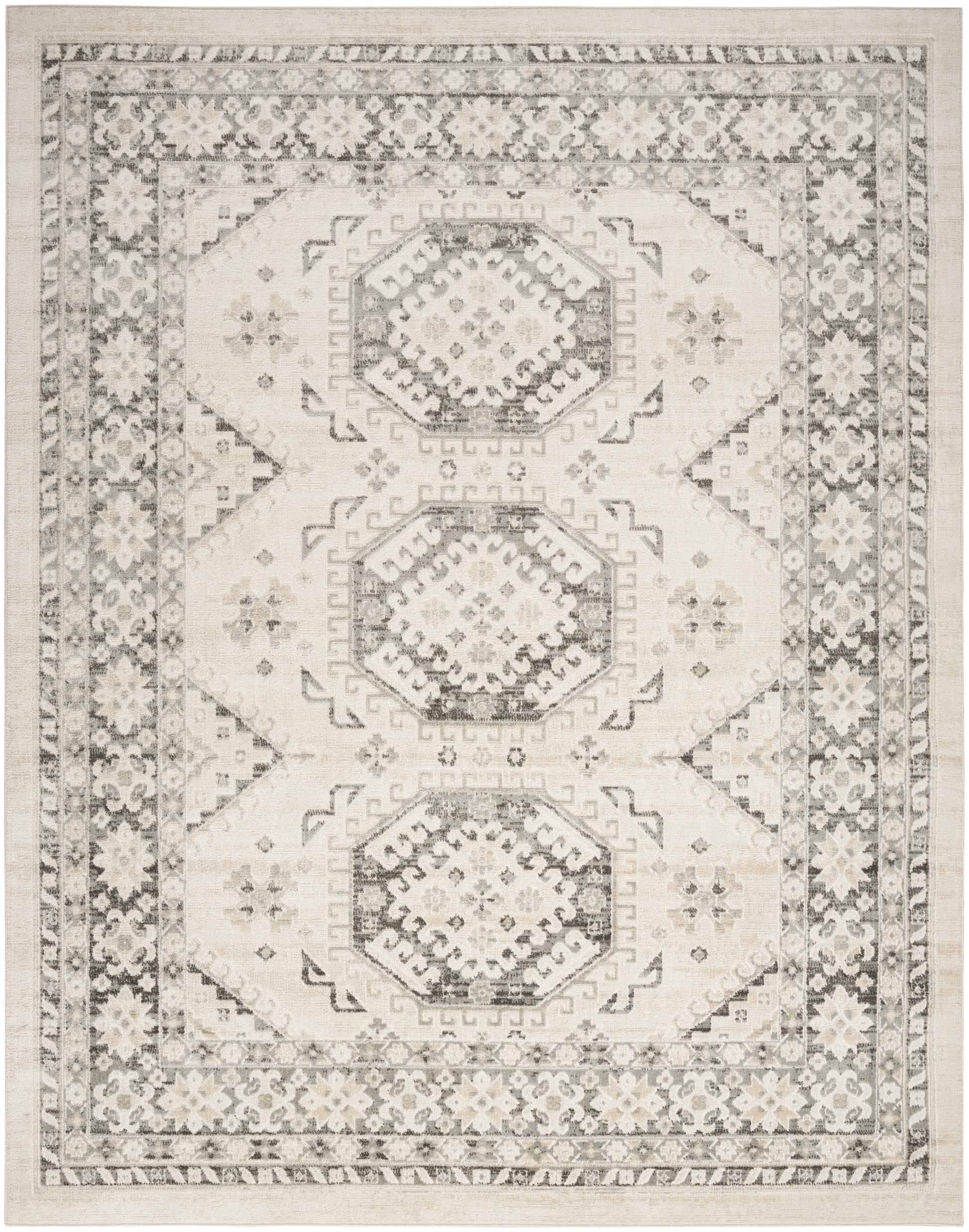 Neutral ivory and gray oriental area rug with three hexagonal medallions and ornate floral border.