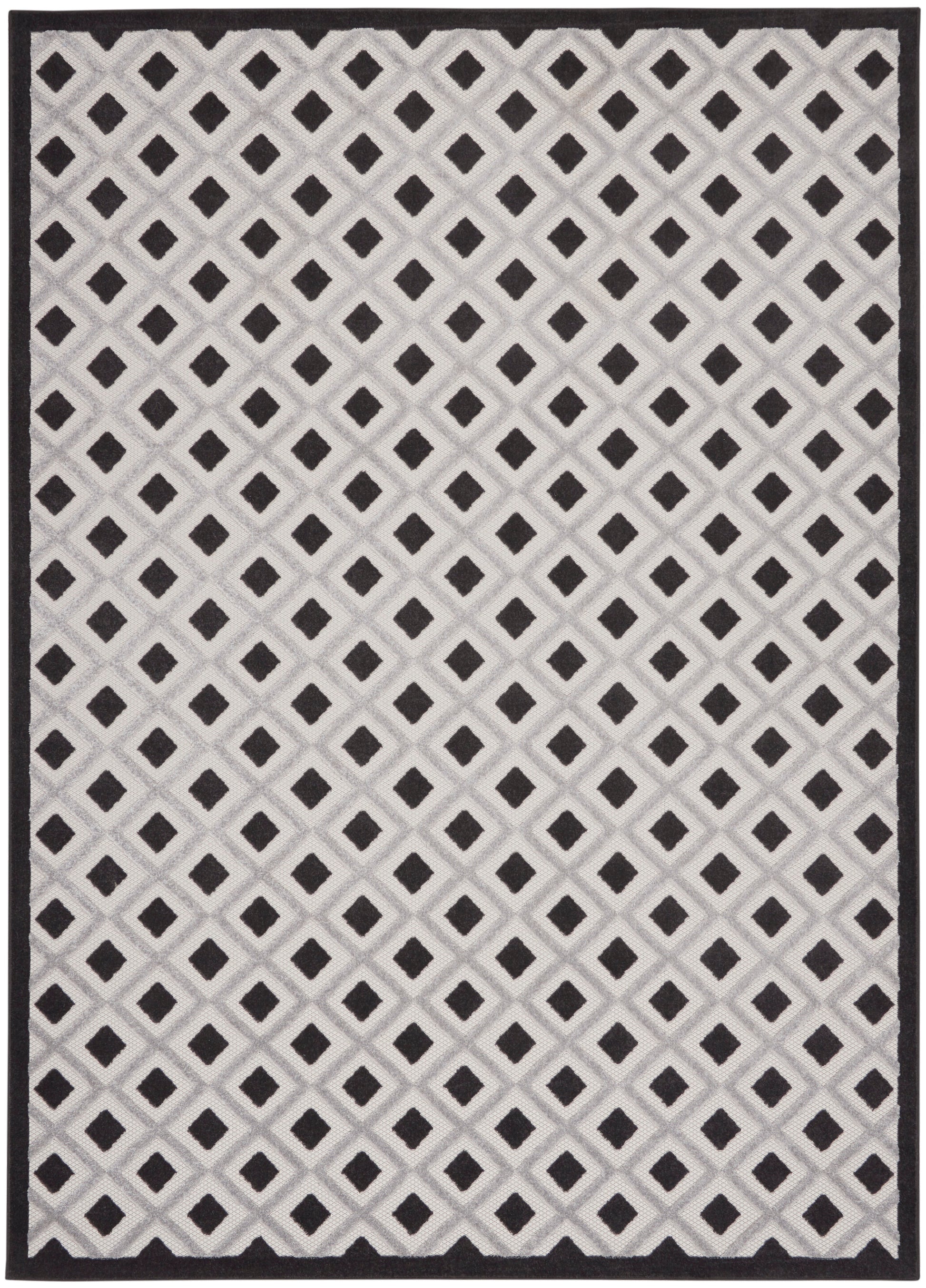 Rectangular rug featuring white & gray lattice diamond pattern with small black diamonds; modern geometric style.