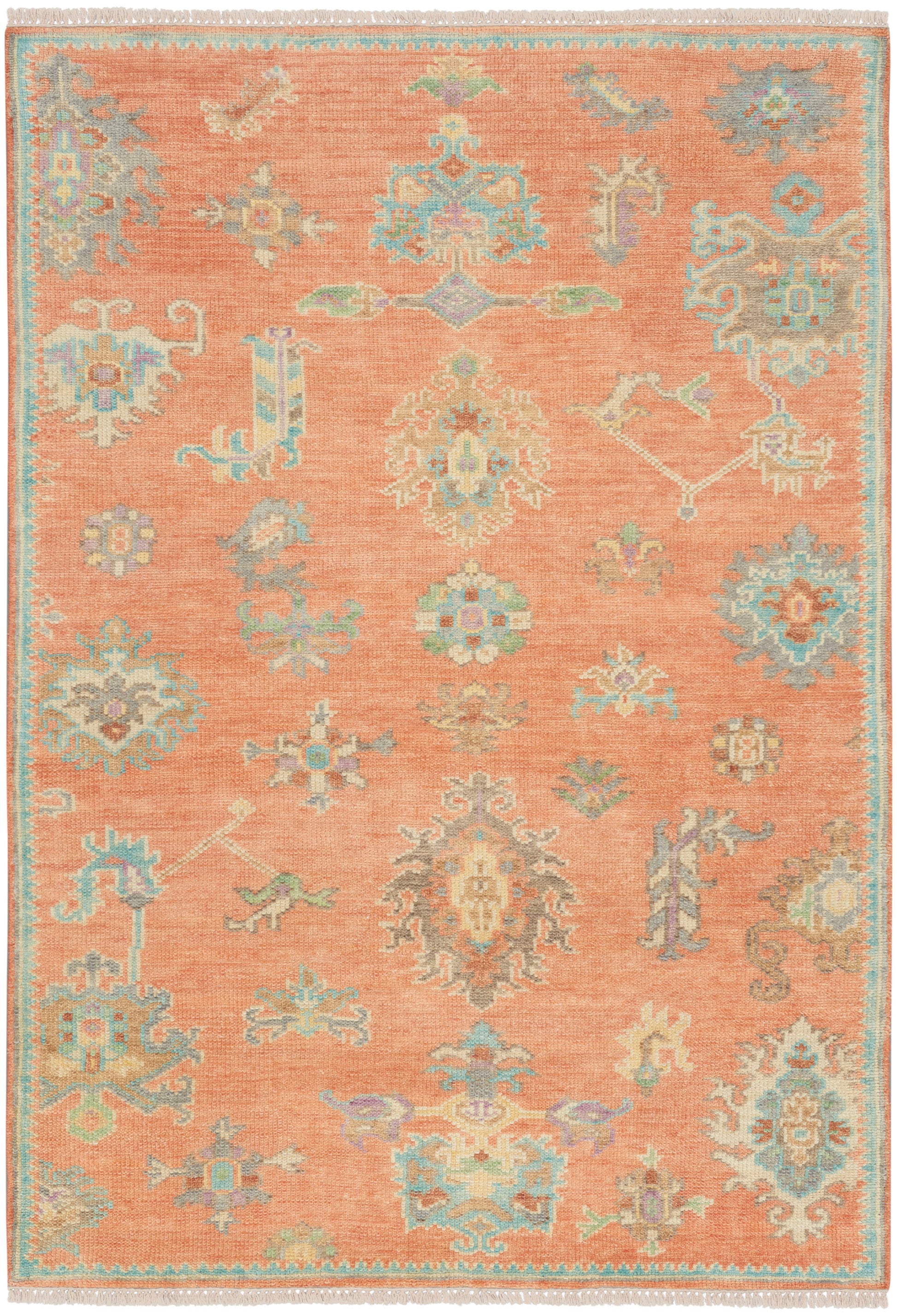 Orange oriental area rug with teal border, ivory & pastel floral medallions, tassel fringe, vintage decorative style.