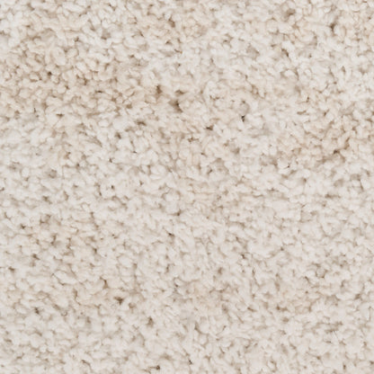 Cream beige plush carpet close-up with soft, high-pile shag texture & cozy look.