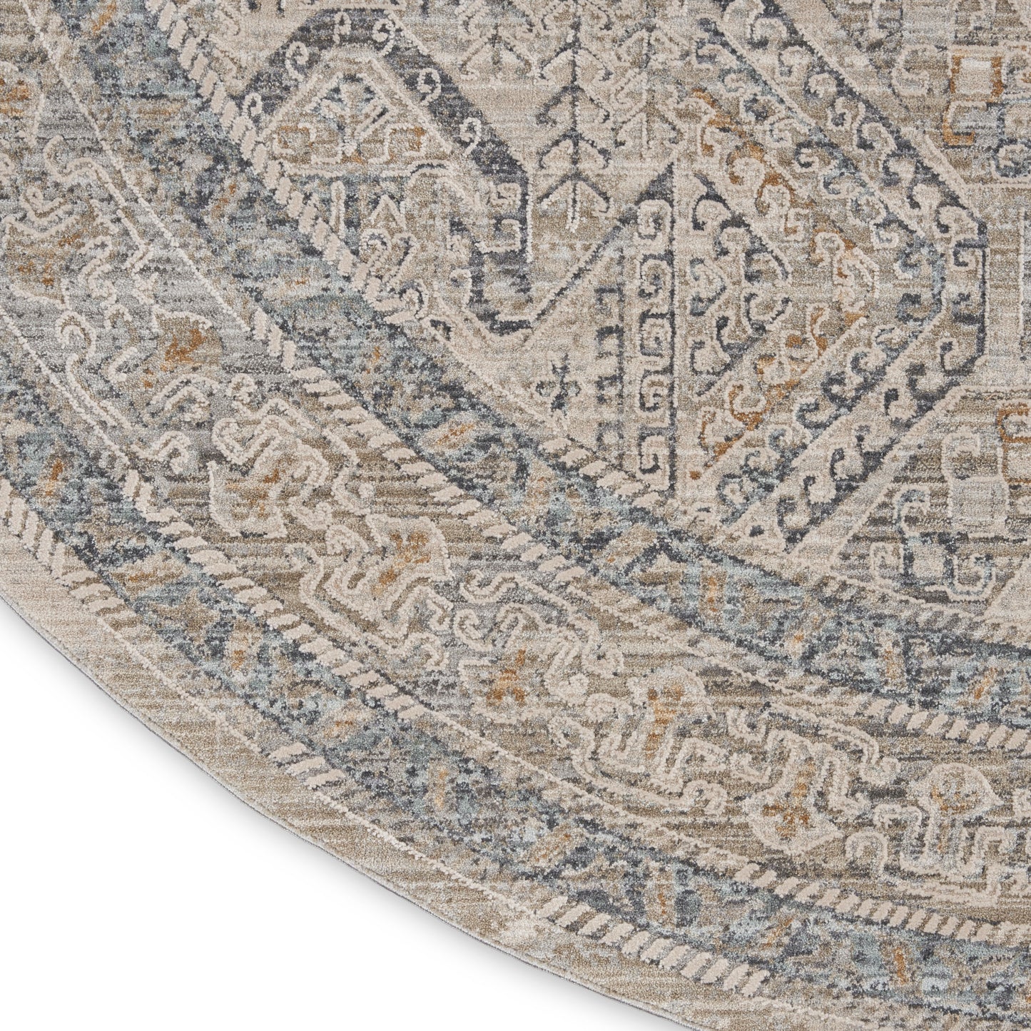 Round distressed oriental rug in muted blues, beiges and ivory with geometric border; woven vintage look.