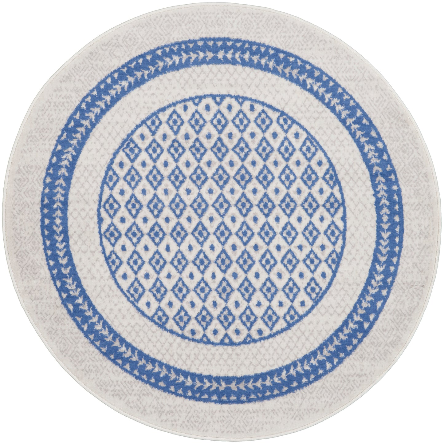 Round white ceramic plate with a blue geometric lattice center and blue patterned rings; decorative dinner plate.