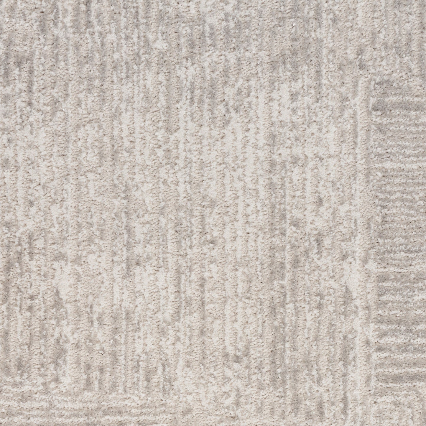 Beige-gray textured area rug with subtle vertical line pattern; soft, low-pile & modern neutral floor covering.