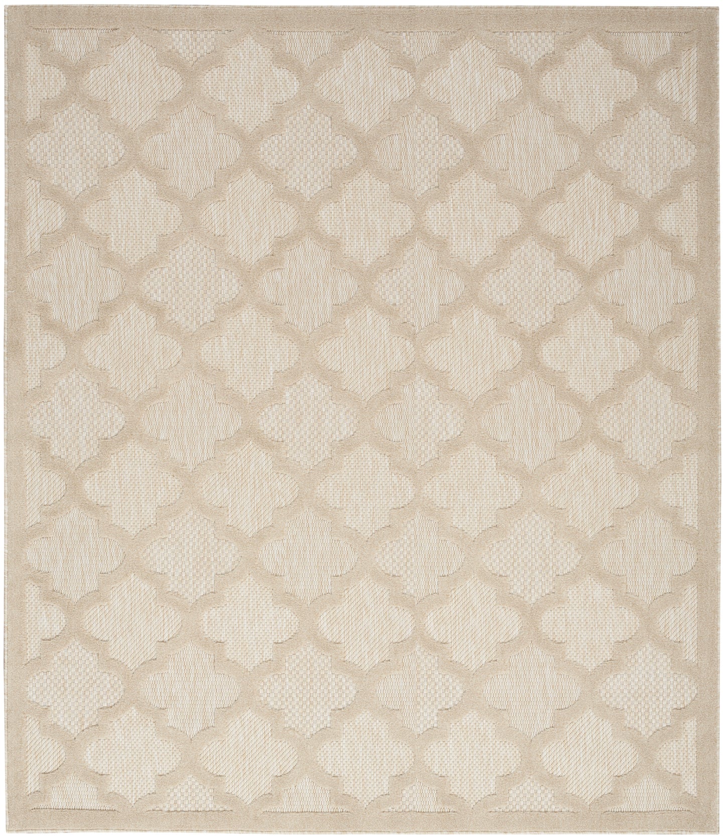 Beige area rug with a subtle trellis/quatrefoil lattice in a textured woven surface.