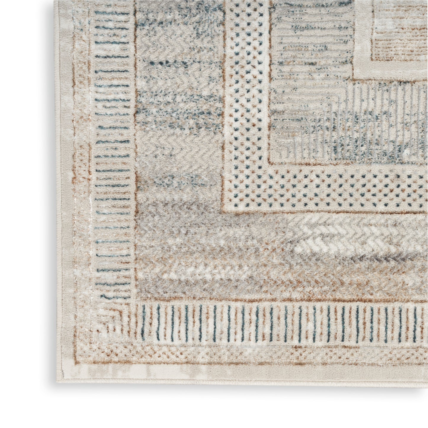 Corner view of a beige and ivory woven runner with blue-gray geometric borders and layered rectangular motifs.