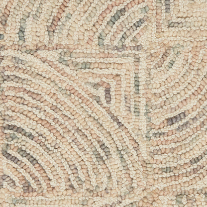 Textured loop-pile rug in cream, beige, blush pink and gray with an abstract curved geometric pattern.