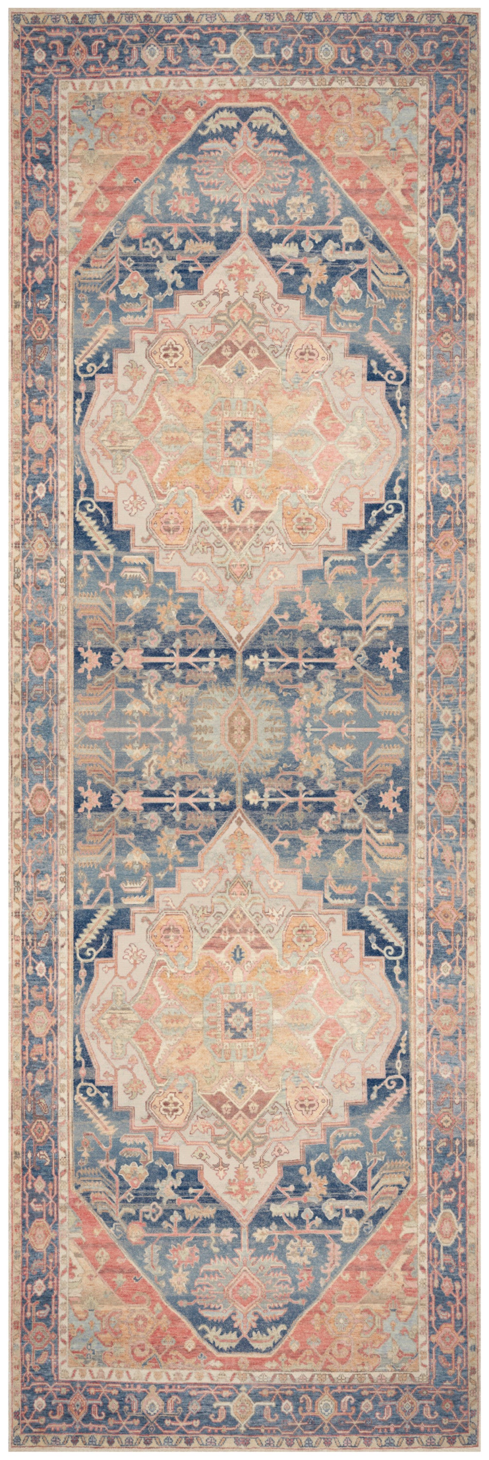 Persian-style runner rug in navy, peach and ivory with geometric medallions and floral borders; hallway decor