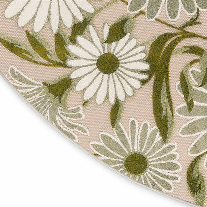 Beige outdoor round rug with white daisies, olive-green centers and leaves; close-up view.