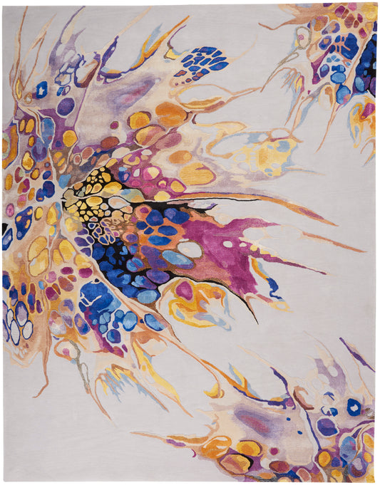 Abstract multicolor area rug featuring pebble-like shapes in yellow, blue, purple, orange on a light gray background.