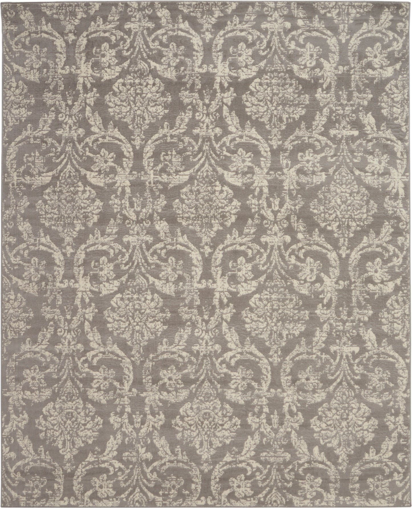 Taupe-gray rug with ivory damask floral scroll pattern; traditional woven style for living room decor.