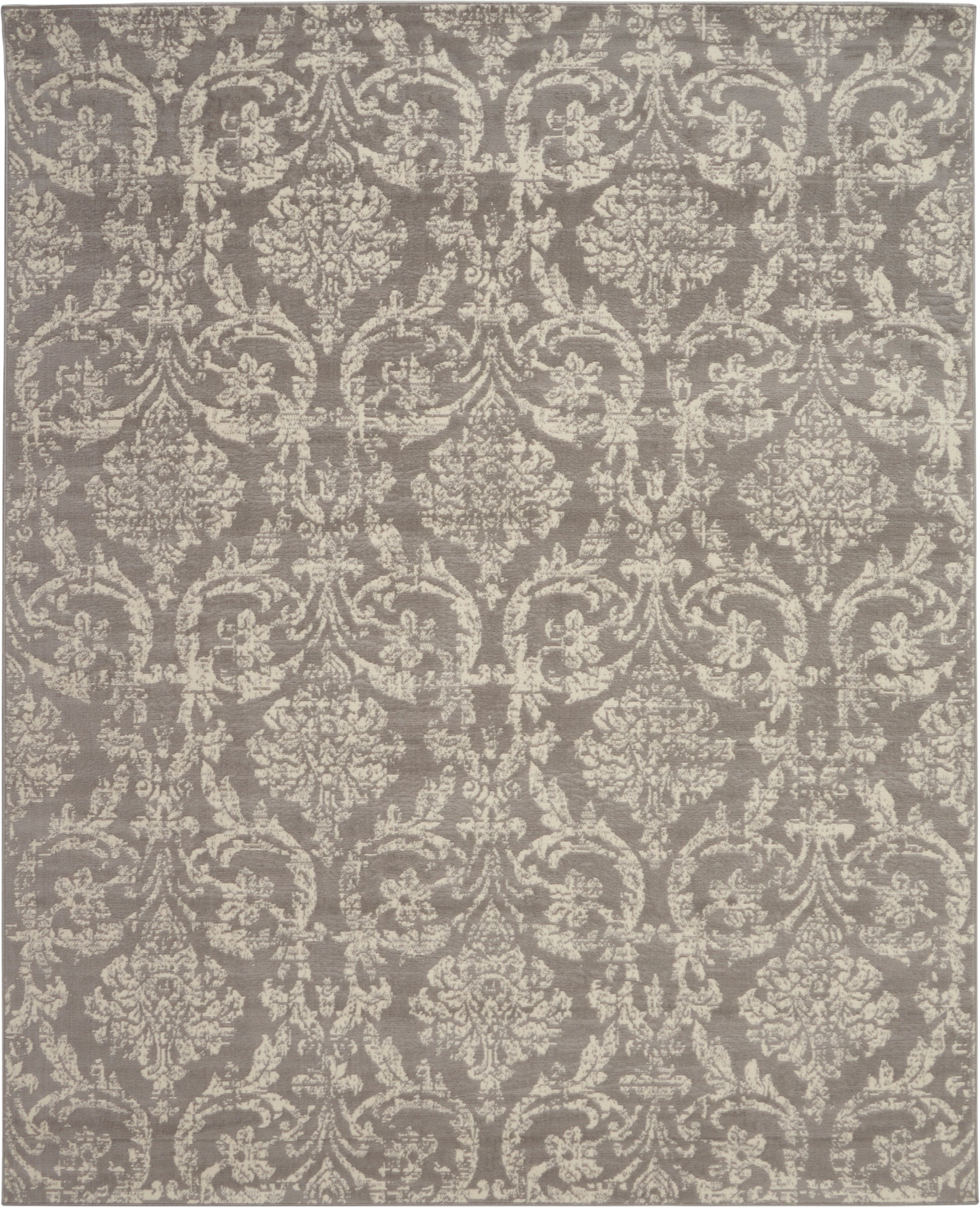 Taupe-gray rug with ivory damask floral scroll pattern; traditional woven style for living room decor.