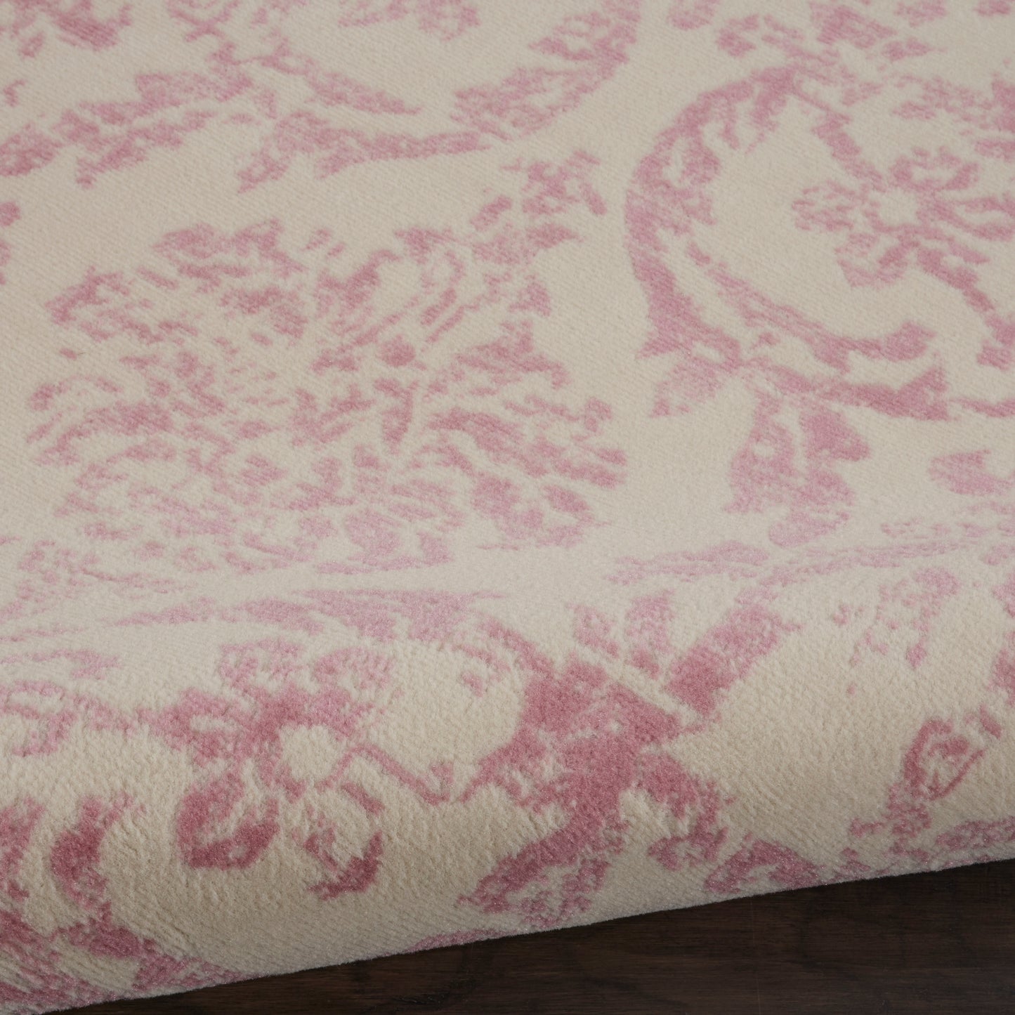 Ivory round rug, 5 ft diameter, featuring a pink damask floral pattern and soft jacquard texture.