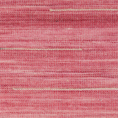 Close-up of pink woven rug with beige horizontal stripes; textured surface.
