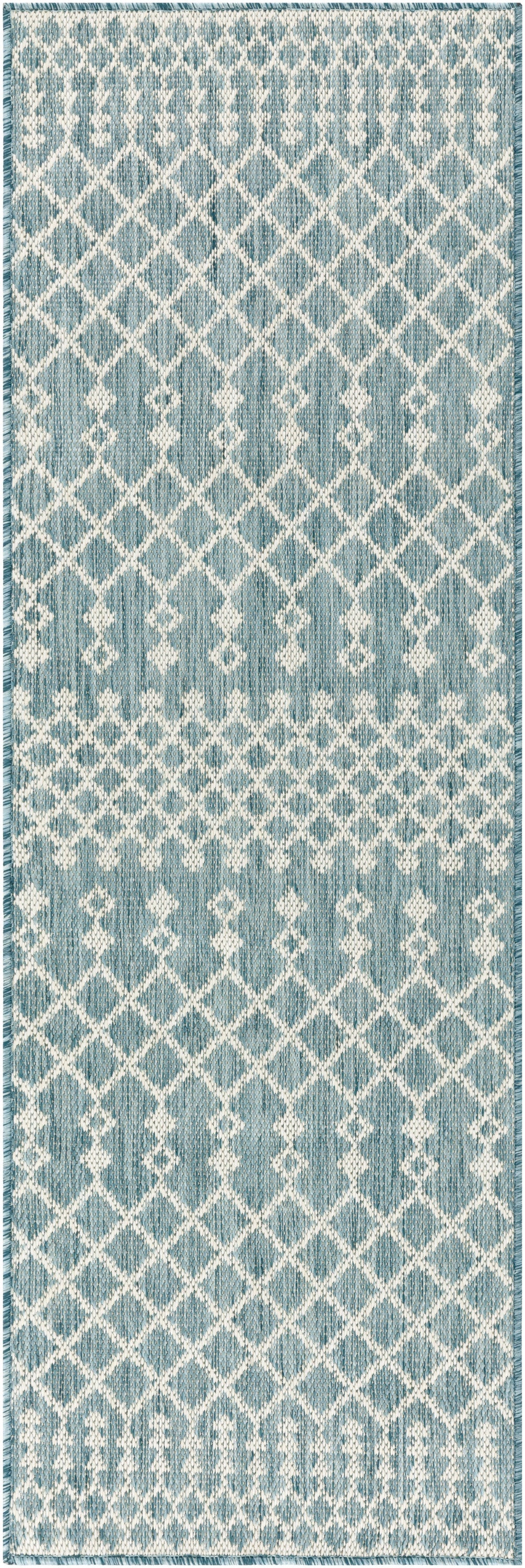 Blue and white geometric lattice runner rug with diamond pattern and fringed ends.