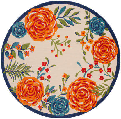 Round floral rug with cream background, vivid orange and teal flowers, green leaves, navy edge.
