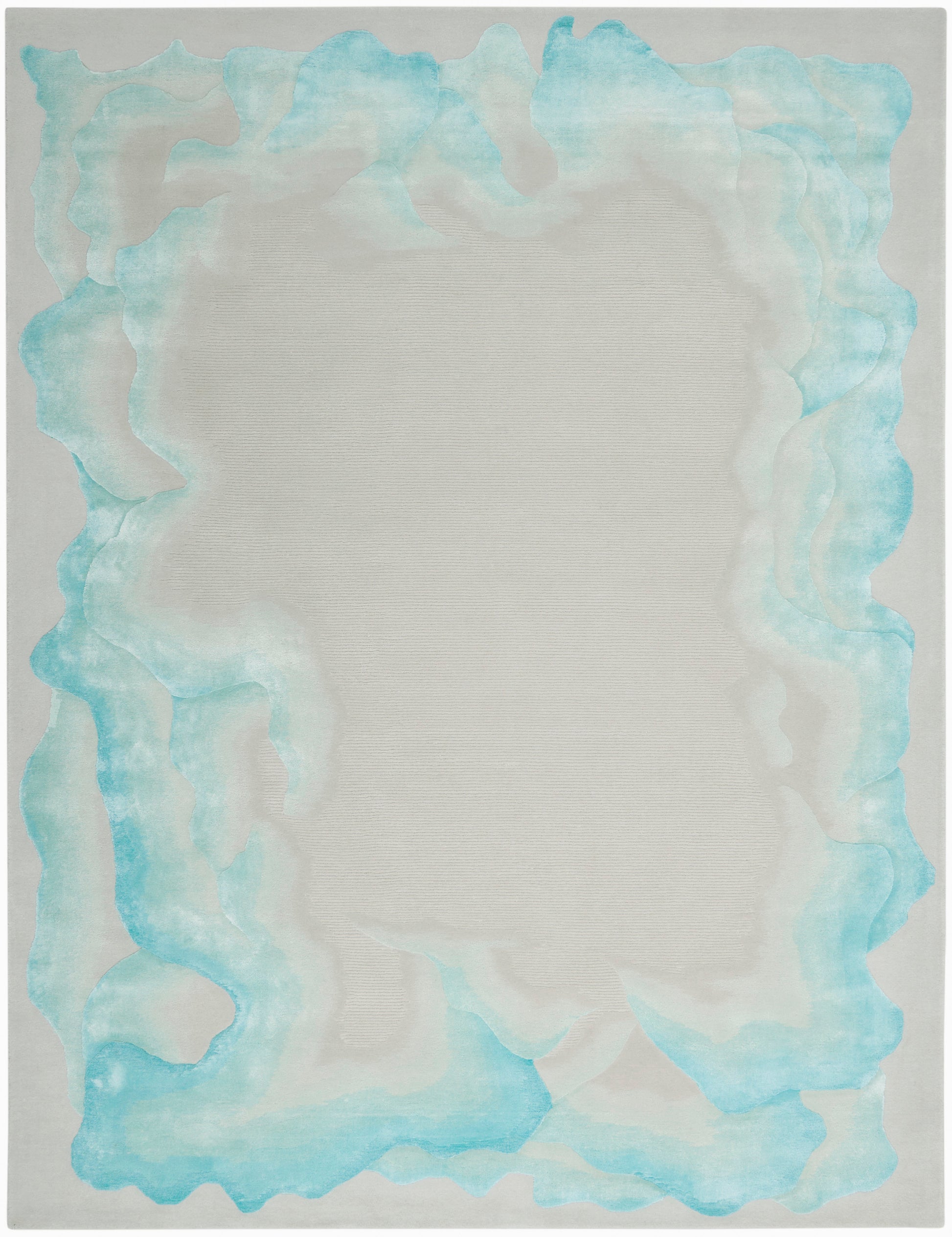 Rectangular rug with beige center and a wavy turquoise aqua border, modern coastal style.