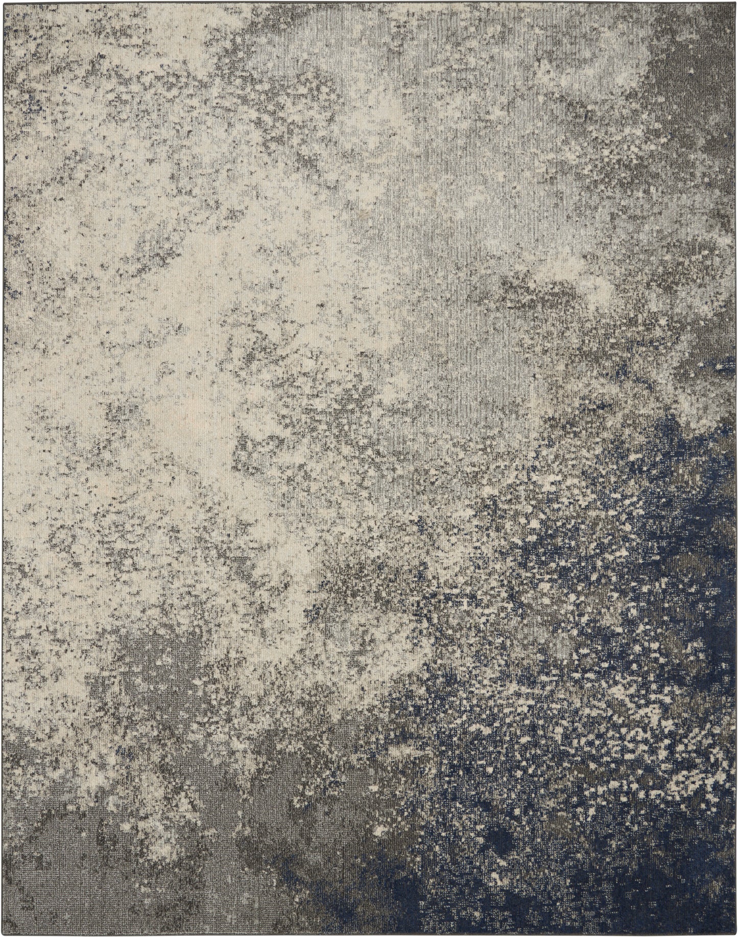 Abstract textured area rug in cream, gray and navy with speckled gradient; soft pile for modern decor.