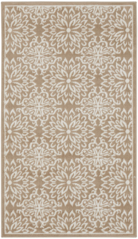 Beige rectangular rug with a white intricate floral medallion pattern and a subtle border.