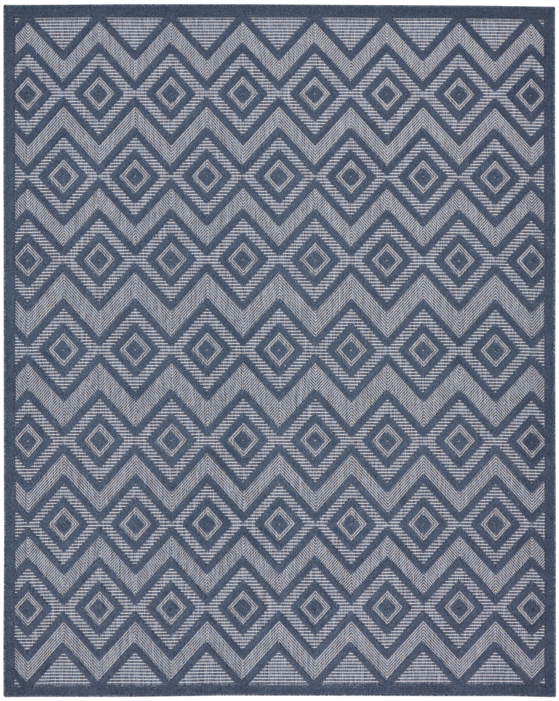 Blue area rug with repeating diamond motifs and chevron pattern in navy and light blue, geometric woven design.