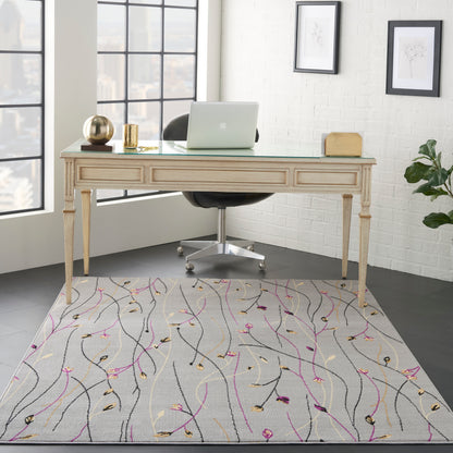 Cream rug with colorful lines.
