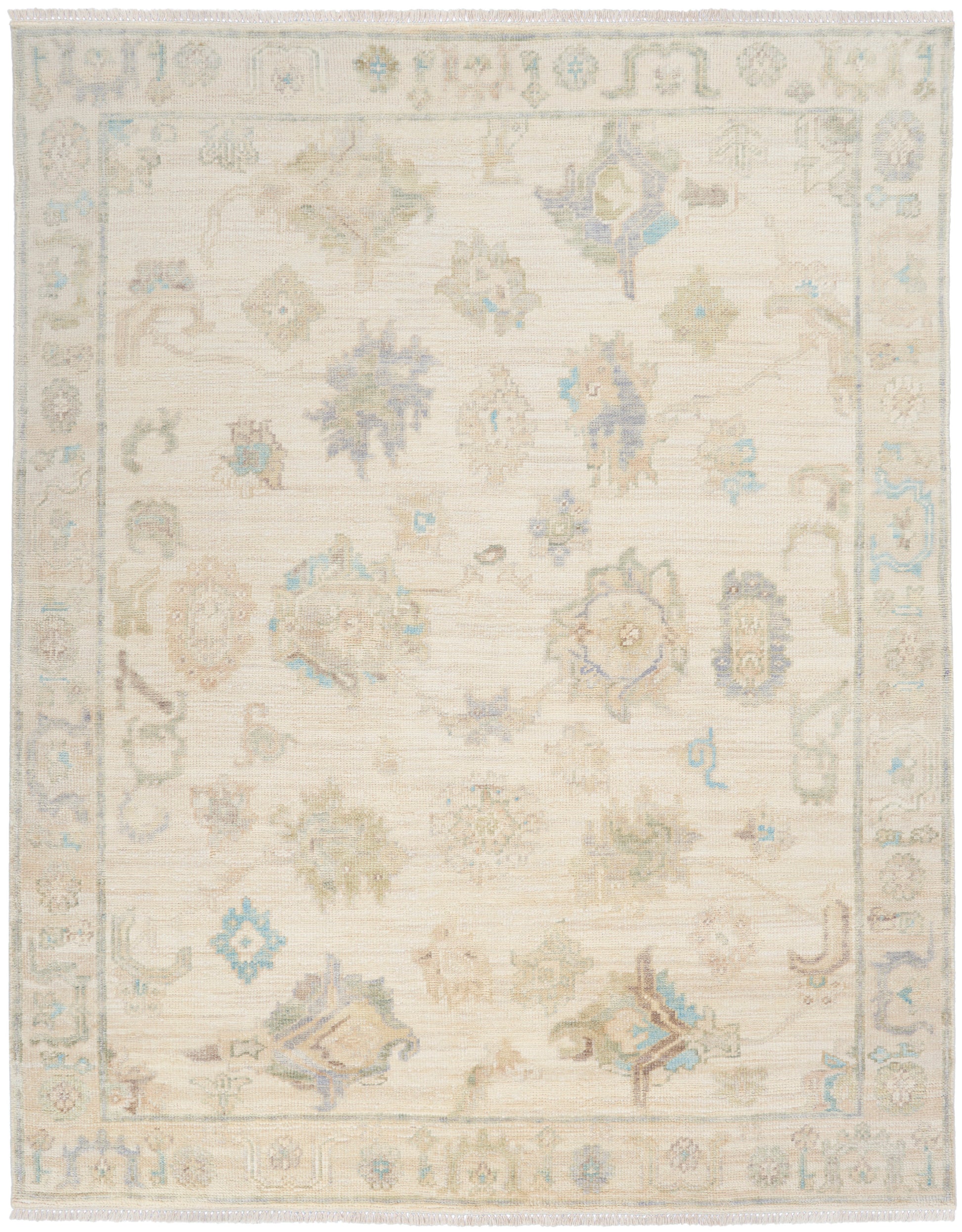 Rectangular ivory woven rug with faded pastel florals and a decorative border; fringed ends.