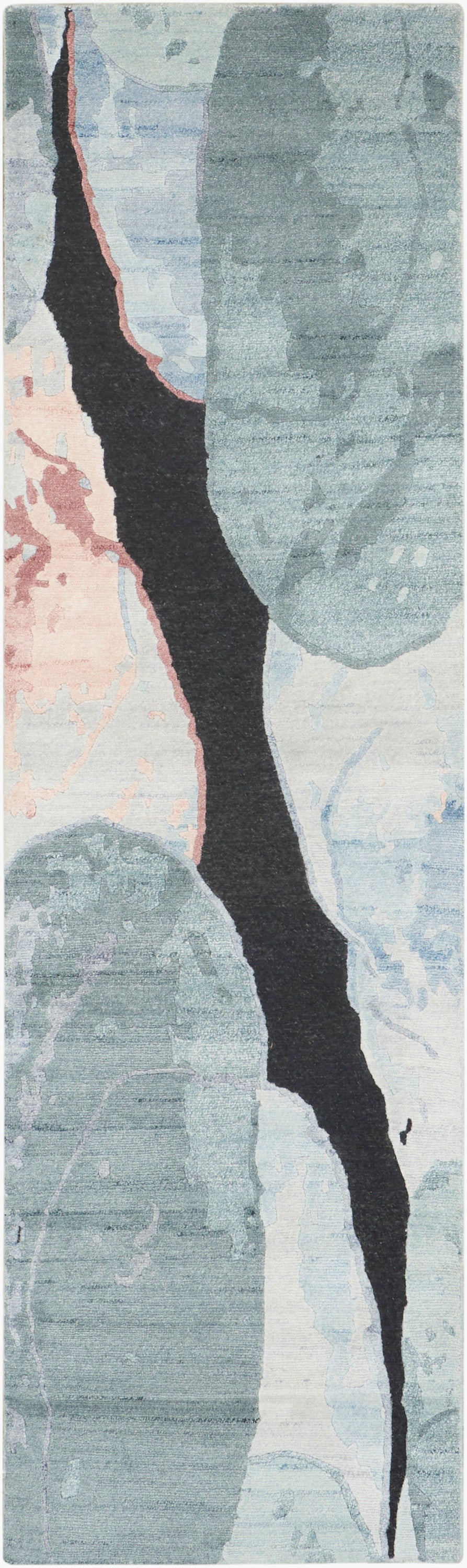 Abstract runner rug in blue-gray tones with a bold black jagged stripe edged in pink.