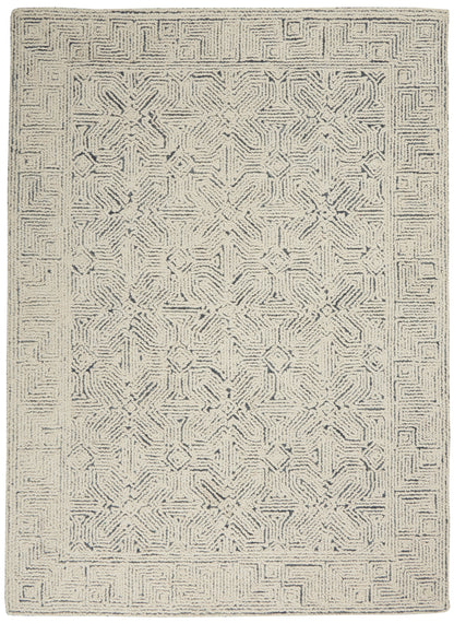 Rectangular cream and charcoal geometric area rug with a central star medallion and meander border; soft textured pile.