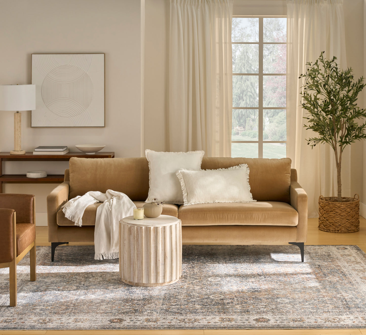 Cozy living room with a vintage-style rug (8' x 10') on the floor in warm neutral tones.