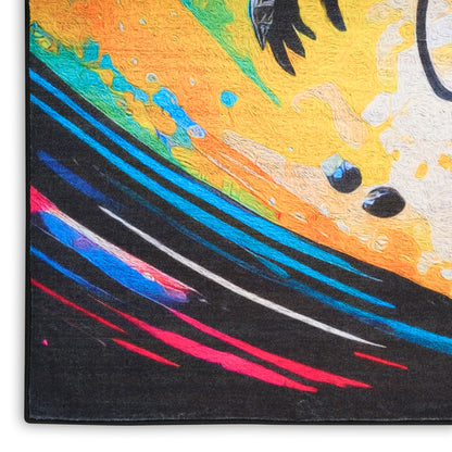 Abstract area rug with a bright yellow/orange patch and blue and pink streaks on black curved lines; kids' rug.