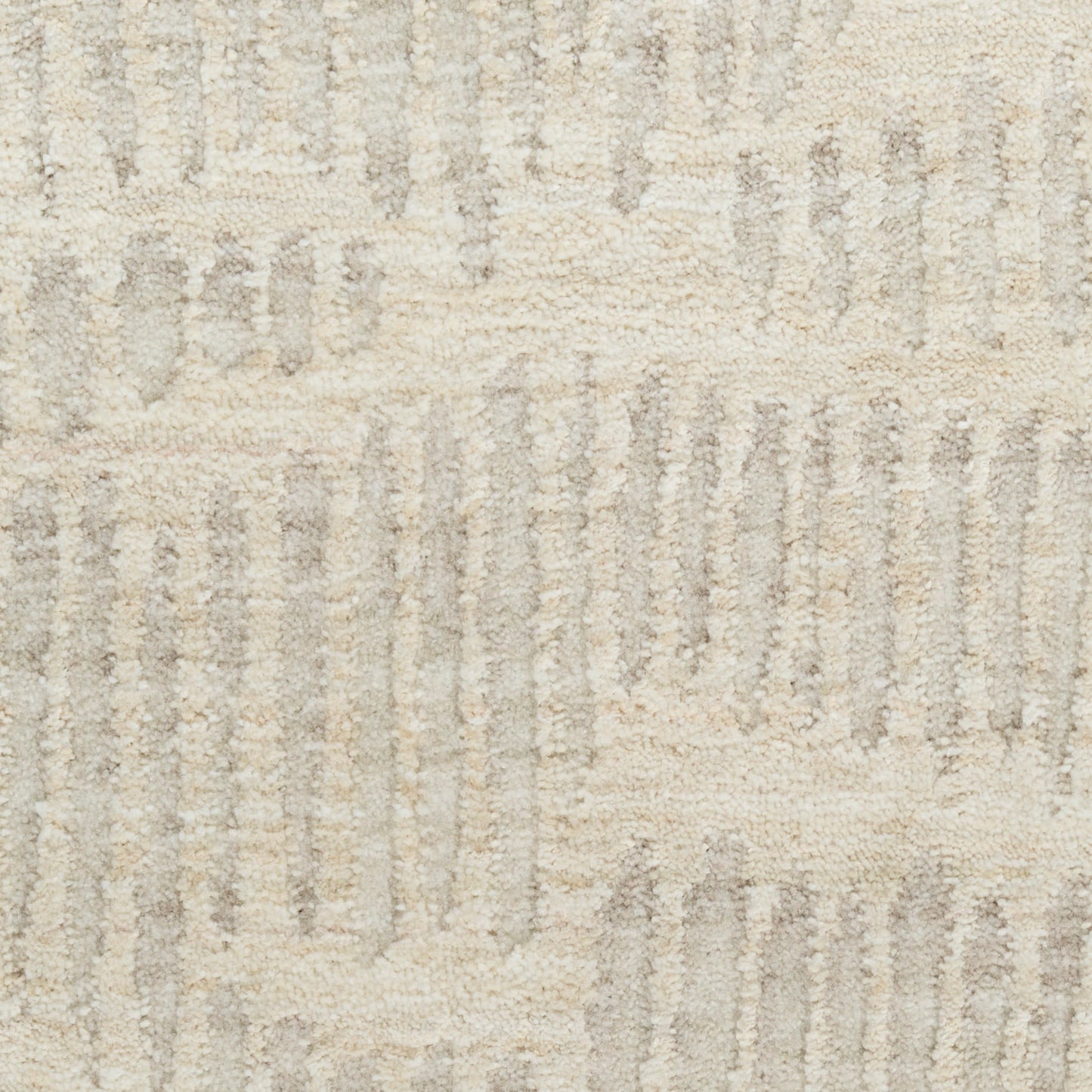Beige textured rug with light gray vertical brushstroke pattern & soft pile for contemporary living spaces.