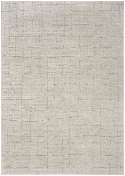 Cream beige rectangular woven rug with a subtle grid pattern and soft, textured surface.