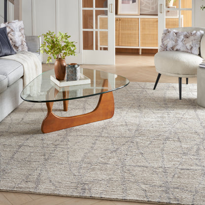 Neutral-toned Scandinavian-style rug with a textured weave, 8' x 10'.