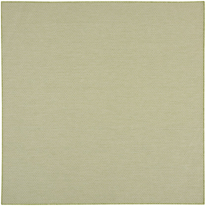 Beige rug with a tiny dark dot lattice pattern and an olive-green border, featuring a textured fabric/mesh-style surface.